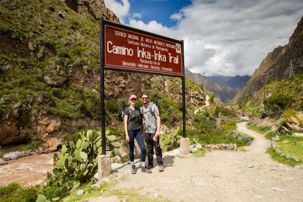 Alex & Amelia standing at the start of the Inca trail in Peru