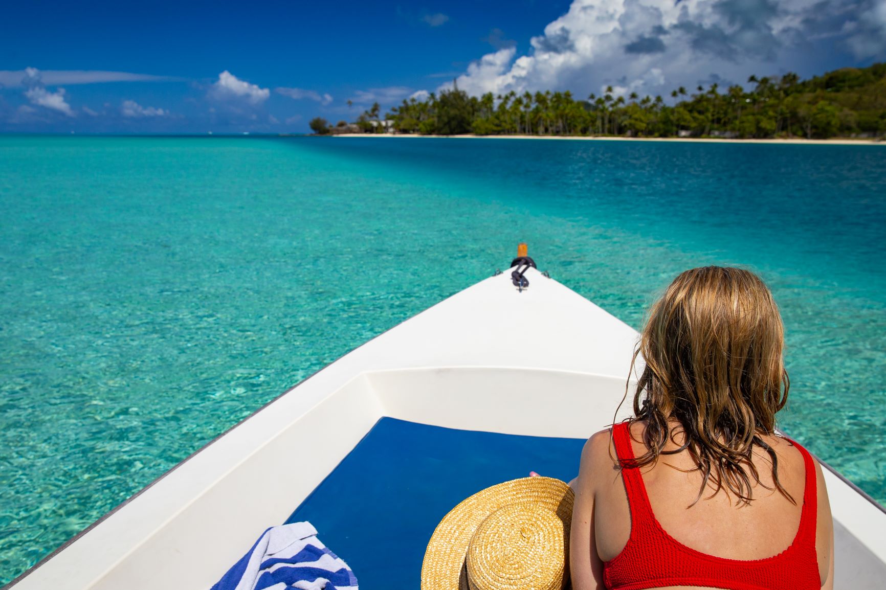 Amelia lying on a boat in Bora Bora